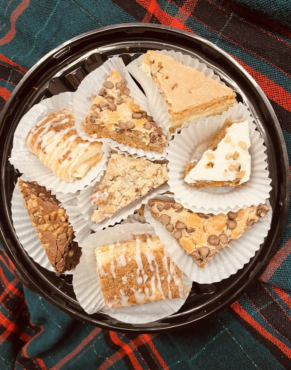 Assorted dessert tray with cakes and pastries.